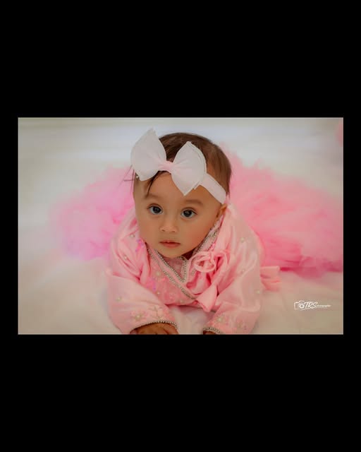 Newborn portrait in pink